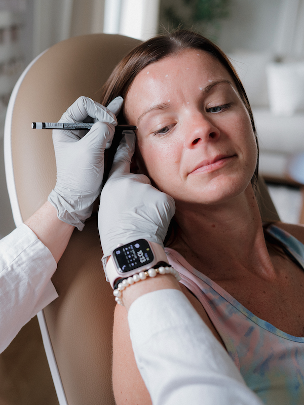 Patient receiving Botox treatment at Simply You