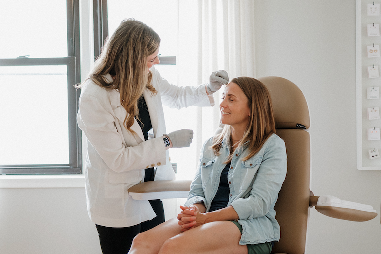 Patient receiving Sculptra Treatment at Simply You