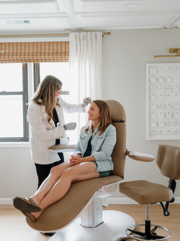 Patient receiving Sculptra Treatment at Simply You