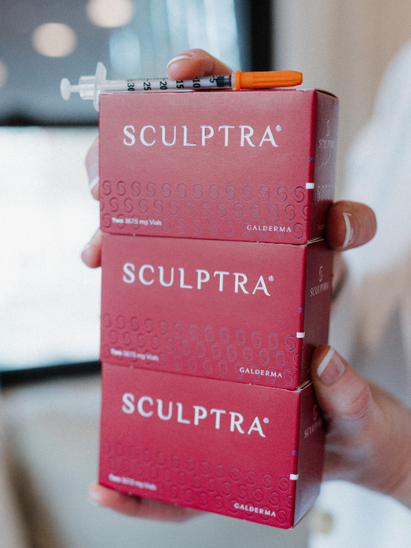 Patient receiving Sculptra Treatment at Simply You
